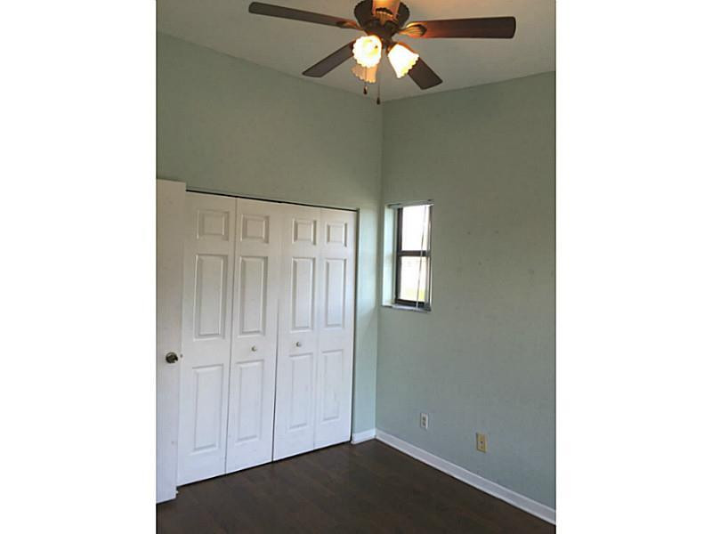 21955 Tidewater Terrace, Unit 208 Boca Raton, FL 33433 - Photo 19 of 26 a view of a hallway with closet