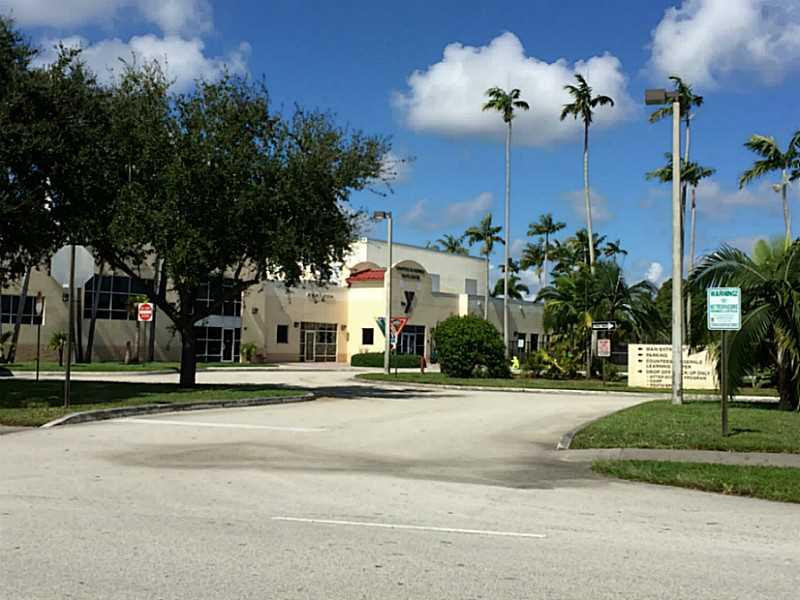 21955 Tidewater Terrace, Unit 208 Boca Raton, FL 33433 - Photo 26 of 26 a view of a building with a yard