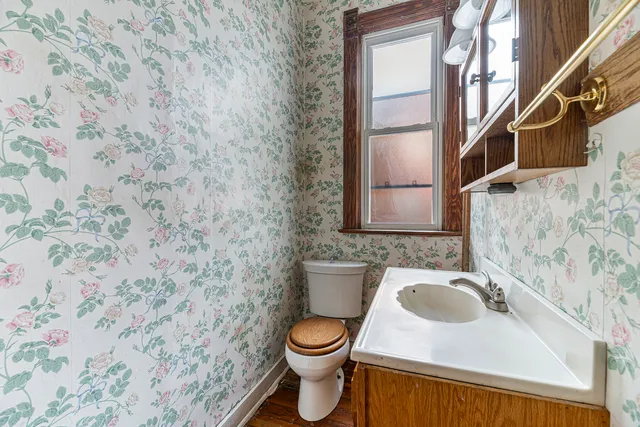 a bathroom with a sink and a toilet