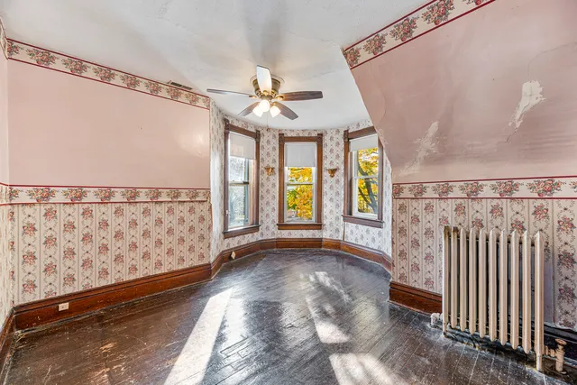 a view of entryway with stairs and wooden floor