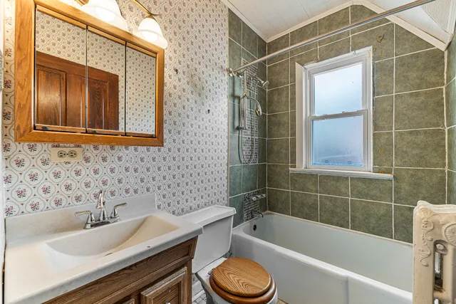 a bathroom with a sink and a bathtub