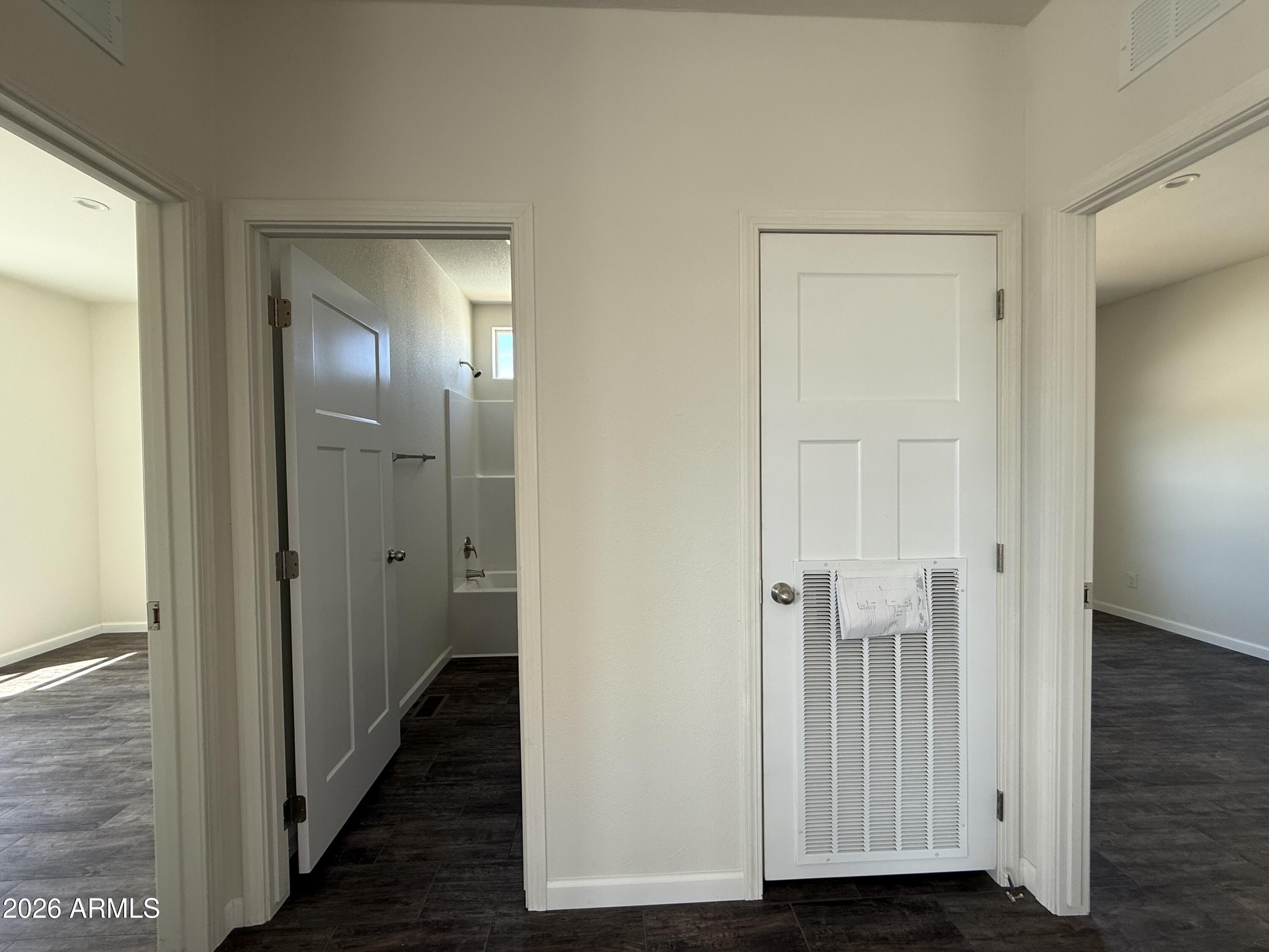 20 Ranch Drive Camp Verde, AZ 86322 - Photo 19 of 31 a view of a hallway with wooden floor