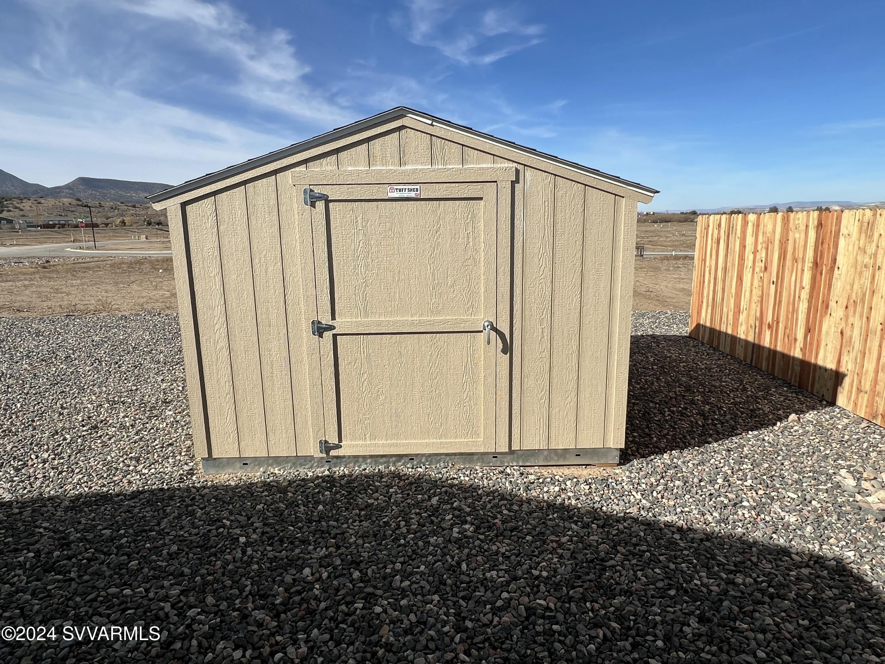20 Ranch Drive Camp Verde, AZ 86322 - Photo 20 of 31 a front view of a house with a wooden door