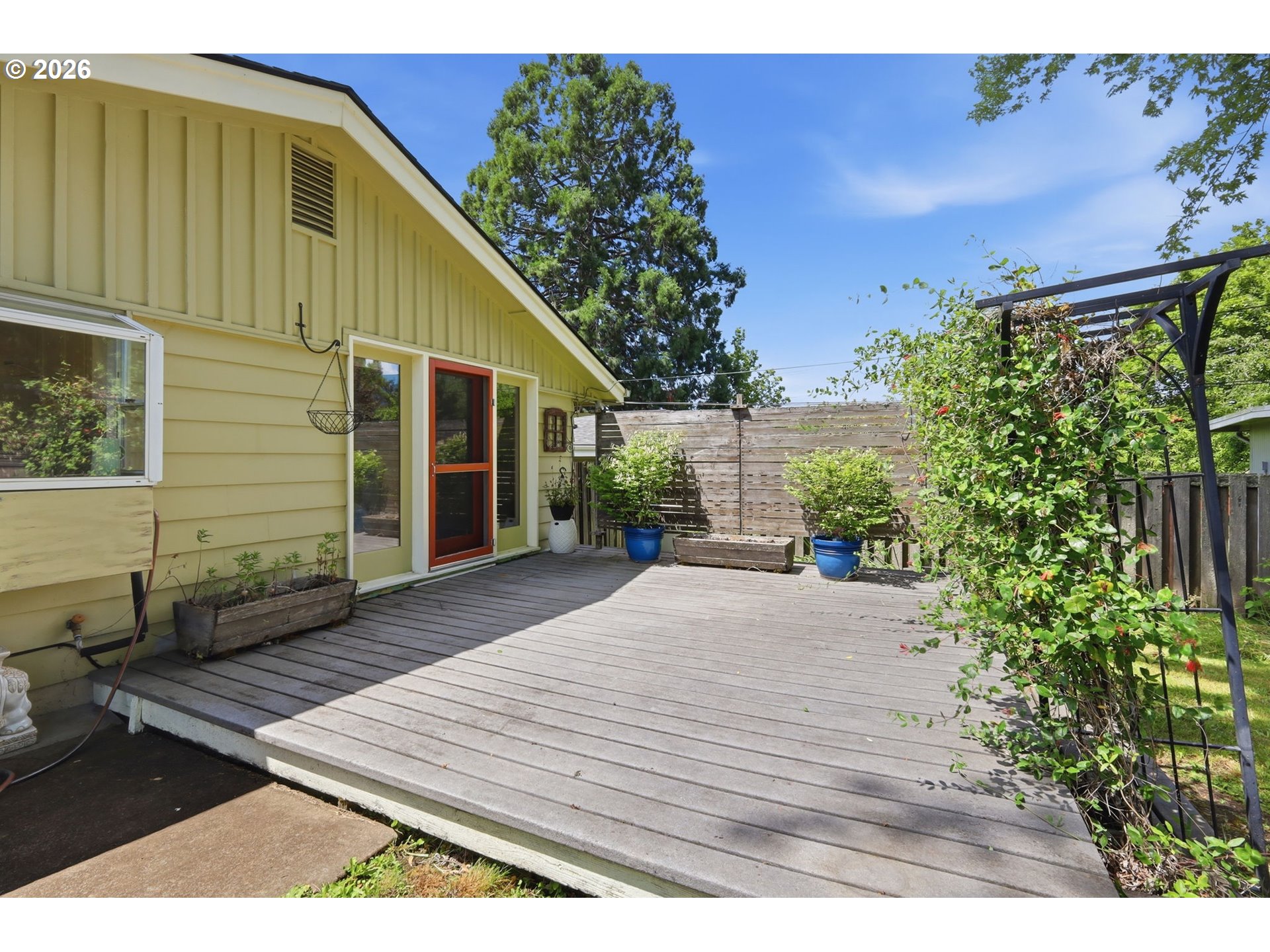 3025 Harris Street Eugene, OR 97405 - Photo 38 of 44 a view of a house with a yard