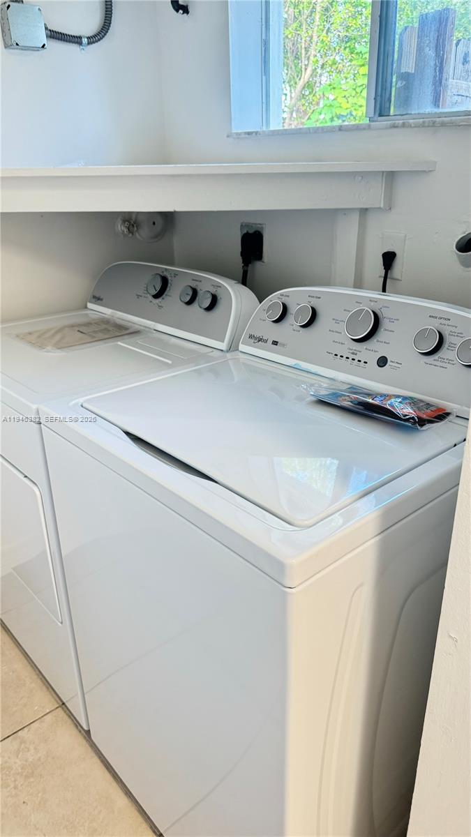 2275 Southwest 61st Avenue Miami, FL 33155 - Photo 14 of 53 a utility room with dryer and washer