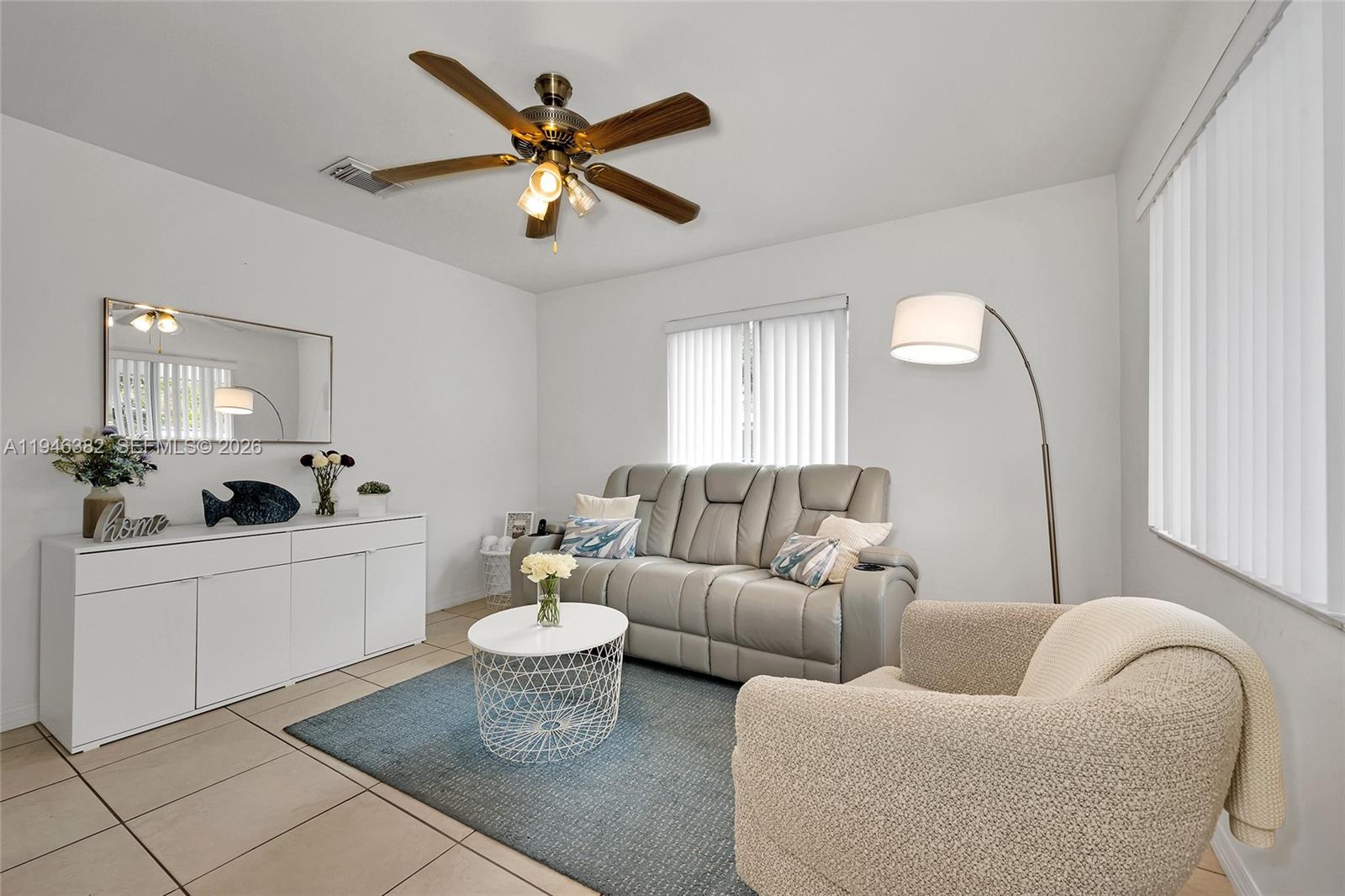 2275 Southwest 61st Avenue Miami, FL 33155 - Photo 27 of 53 a living room with furniture and window