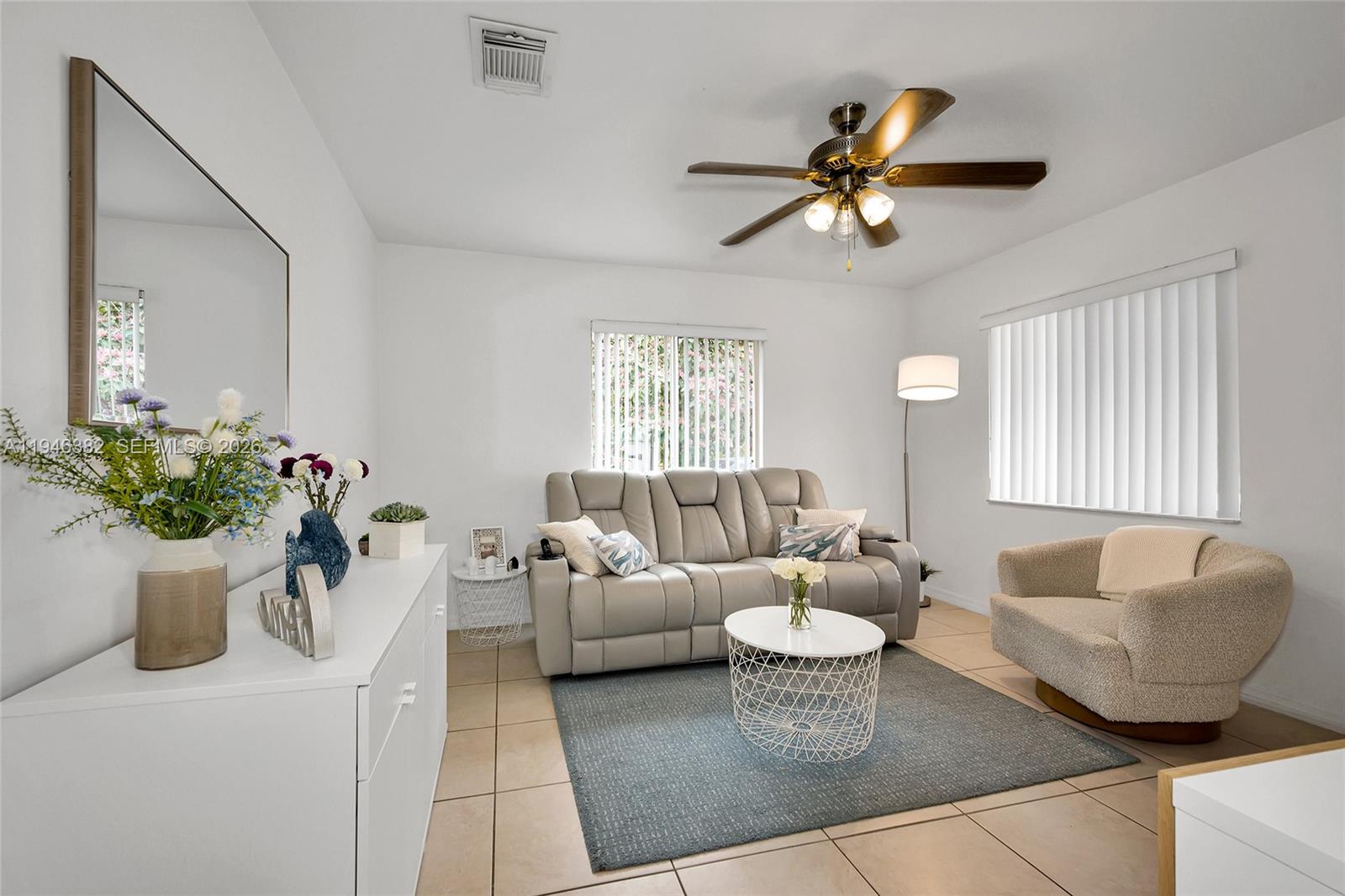2275 Southwest 61st Avenue Miami, FL 33155 - Photo 28 of 53 a living room with furniture and a window