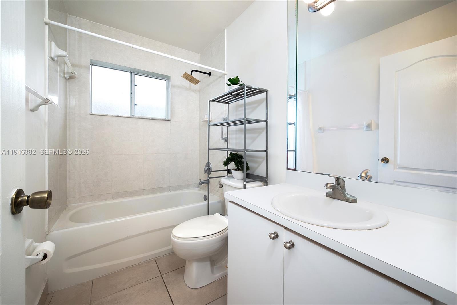 2275 Southwest 61st Avenue Miami, FL 33155 - Photo 44 of 53 a bathroom with a sink toilet and shower