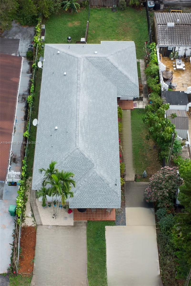 2275 Southwest 61st Avenue Miami, FL 33155 - Photo 47 of 53 an aerial view of a house with a garden and a yard