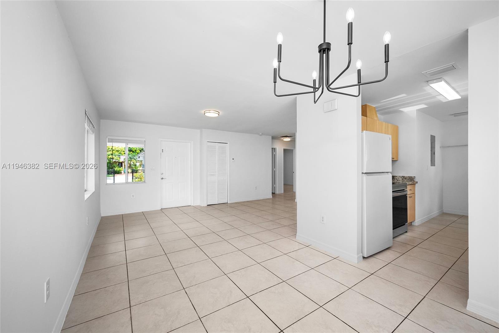 2275 Southwest 61st Avenue Miami, FL 33155 - Photo 9 of 53 a view interior of the house and chandelier