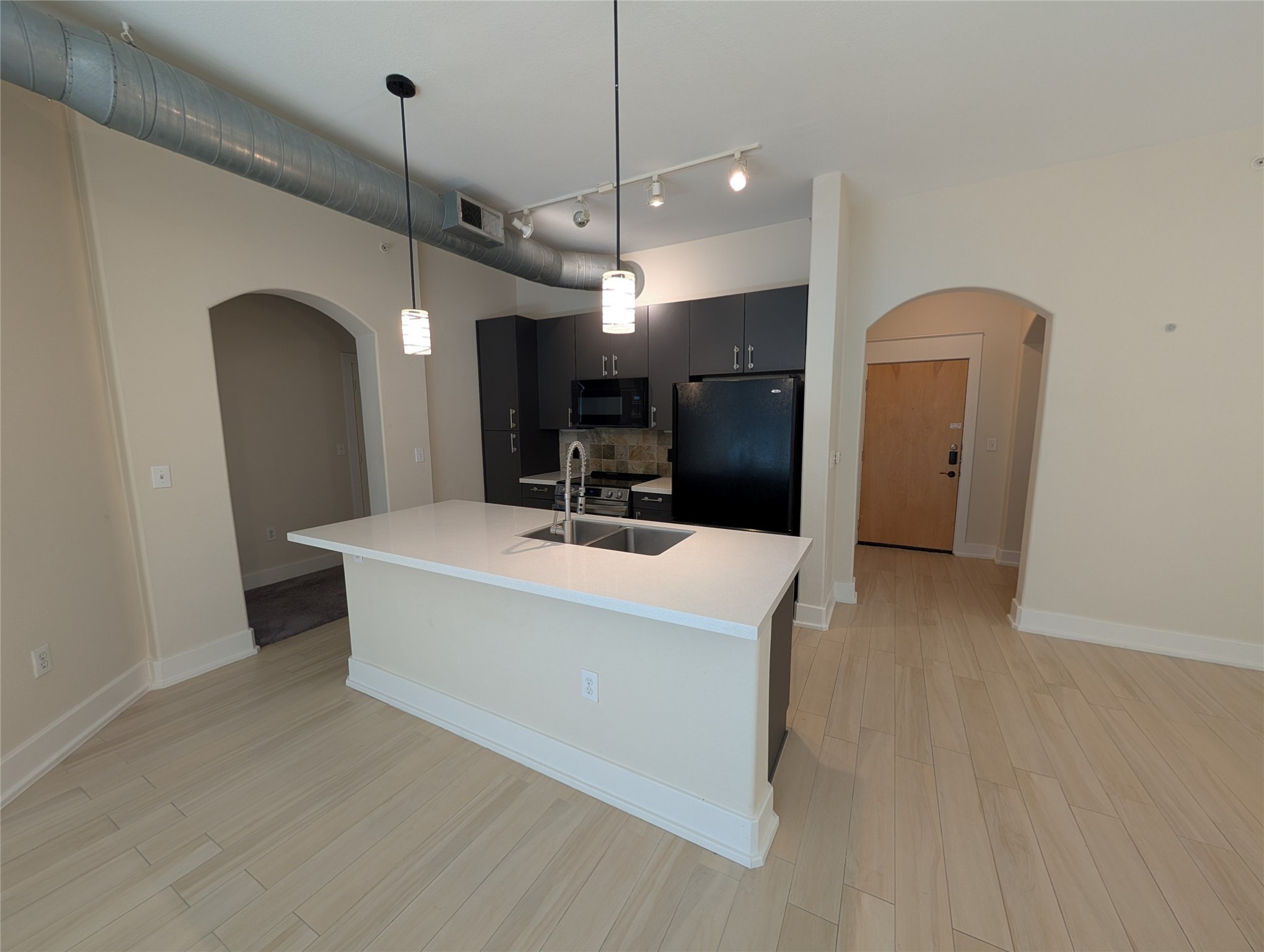 1901 Post Oak Boulevard, Unit 3101 Houston, TX 77056 - Photo 4 of 22 a view of living room with furniture and a chandelier