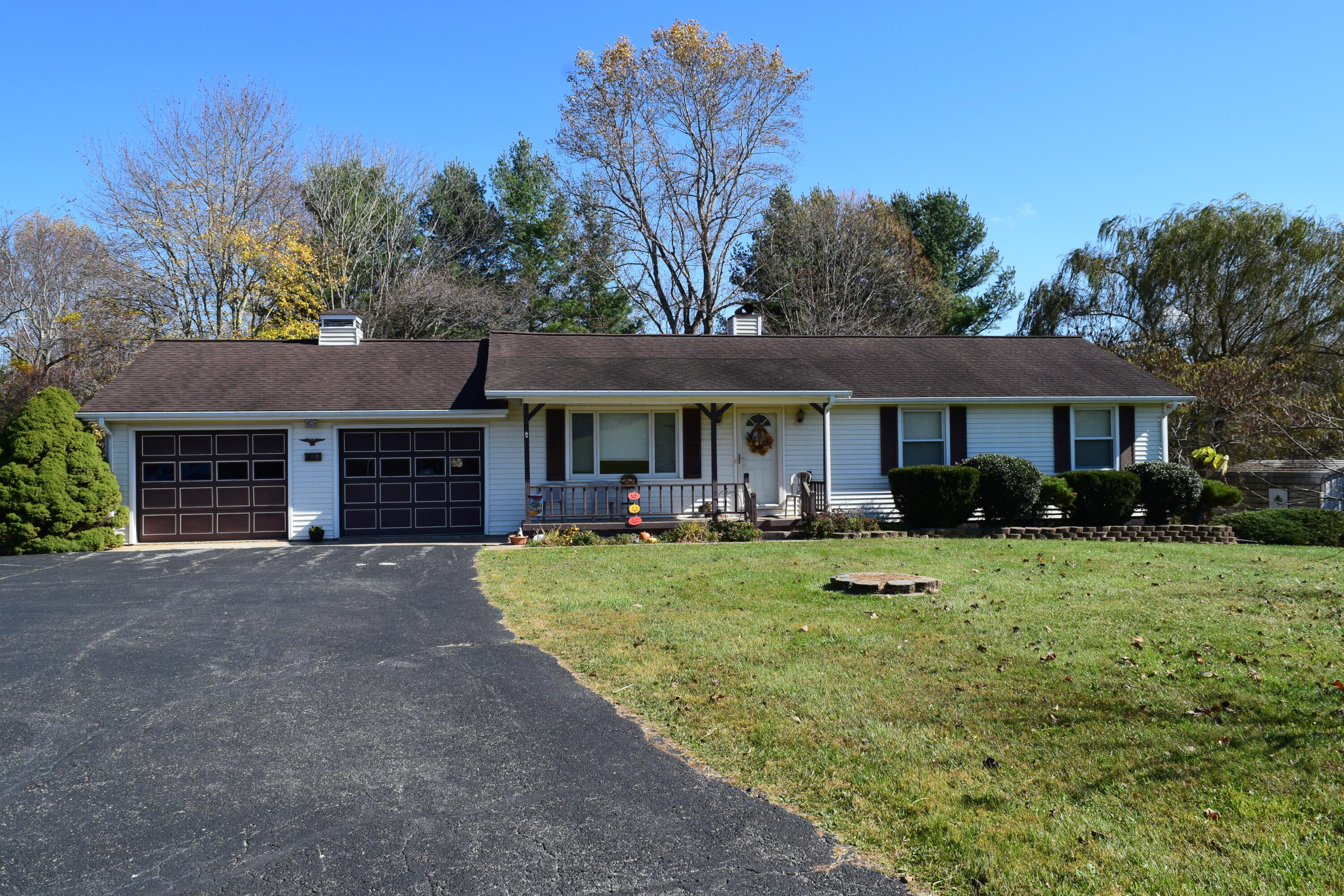 695 Long Level Road Southwest Floyd, VA 24091 - Photo 2 of 55 a front view of a house with yard porch and livingroom