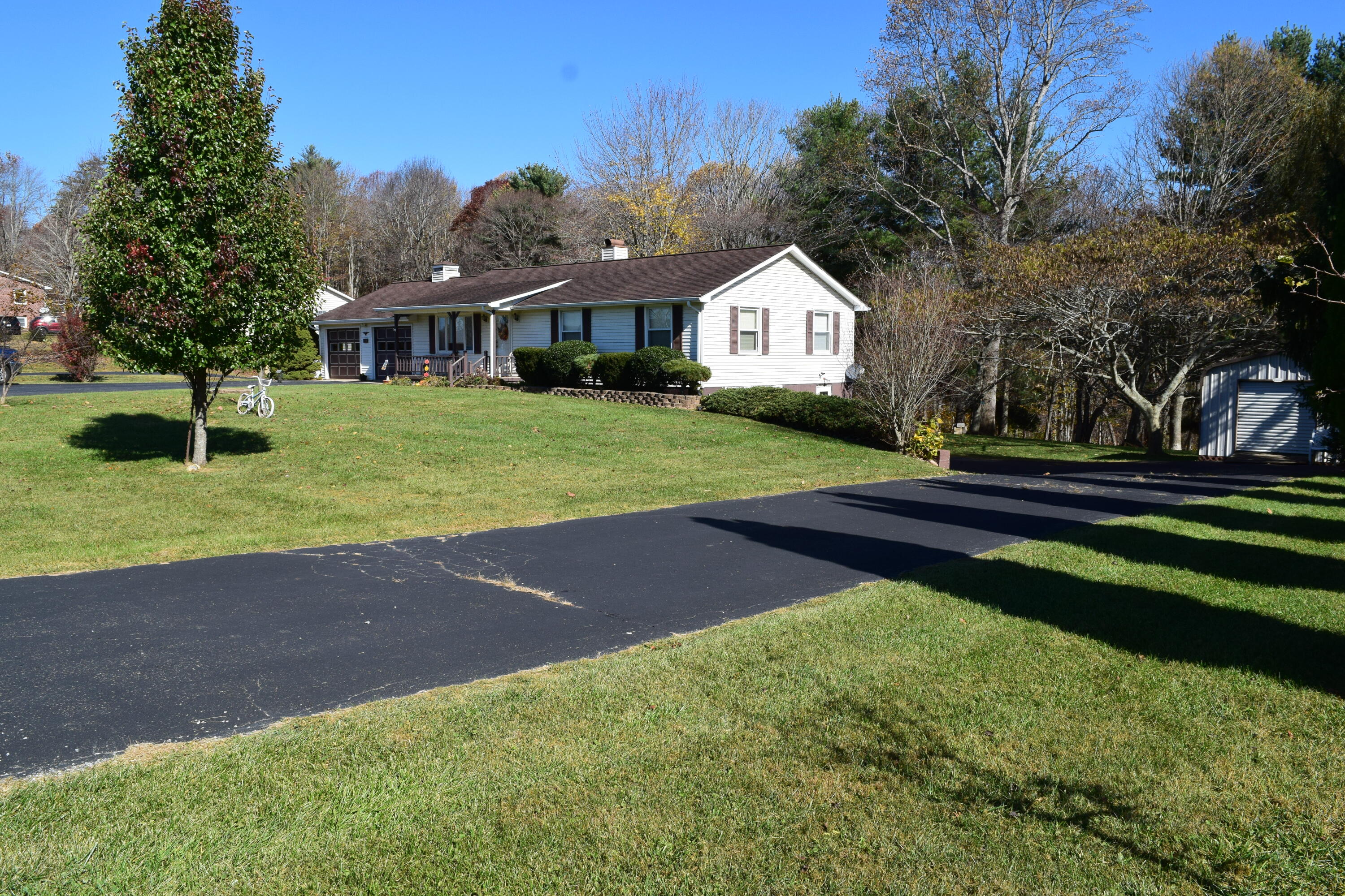 695 Long Level Road Southwest Floyd, VA 24091 - Photo 3 of 55 a front view of a house with garden