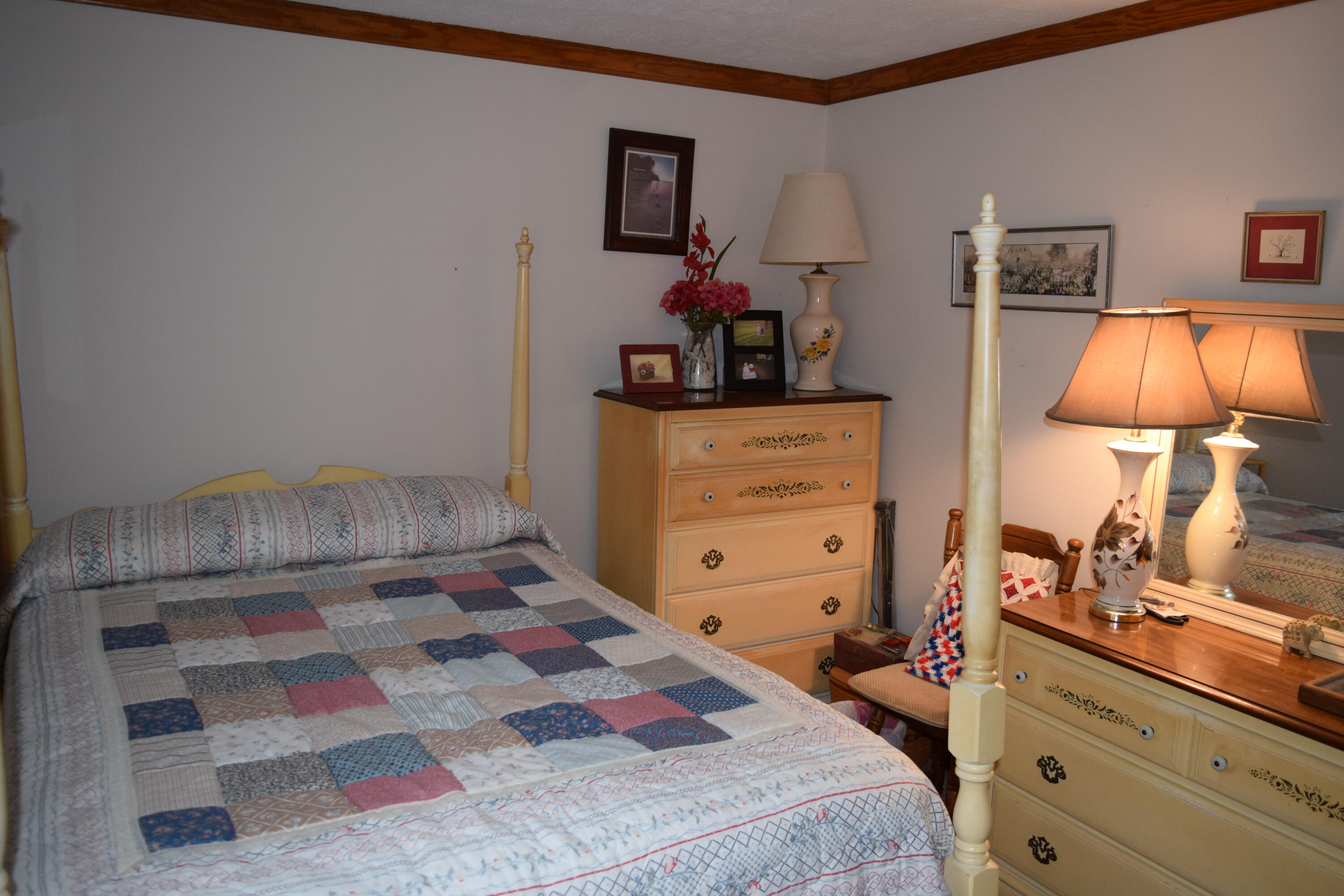695 Long Level Road Southwest Floyd, VA 24091 - Photo 31 of 55 a bedroom with a bed and a lamp on the dresser