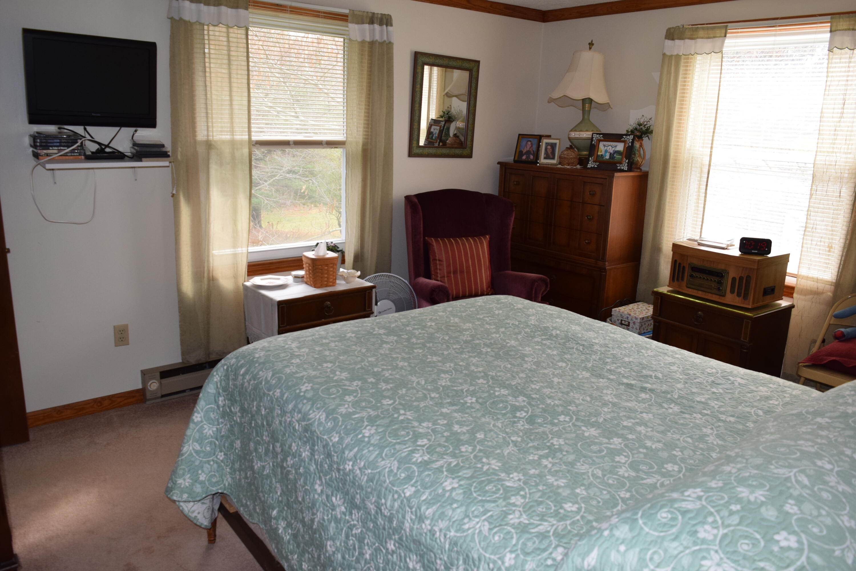 695 Long Level Road Southwest Floyd, VA 24091 - Photo 33 of 55 a bedroom with a bed and wooden floor