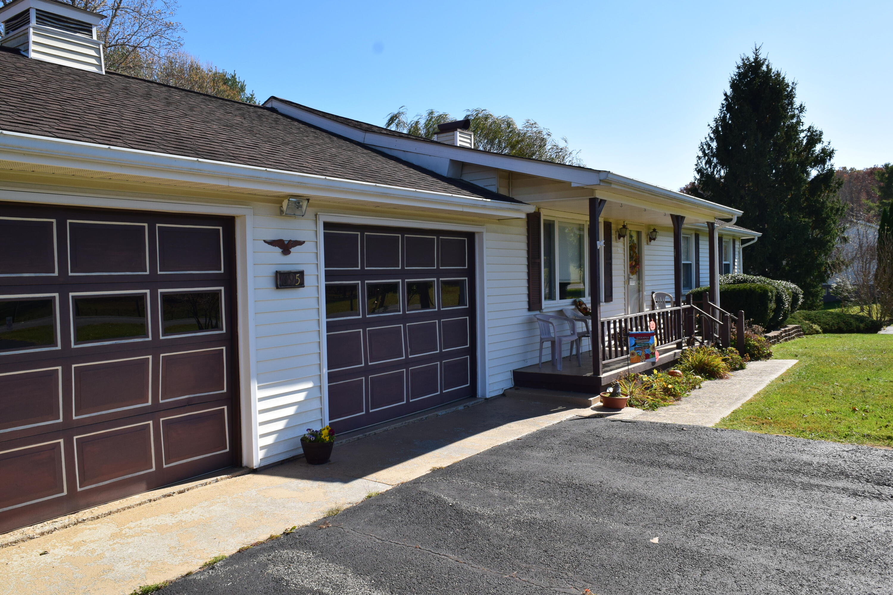695 Long Level Road Southwest Floyd, VA 24091 - Photo 6 of 55 a view of a house with a yard and garage