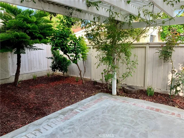 a view of a house with a street