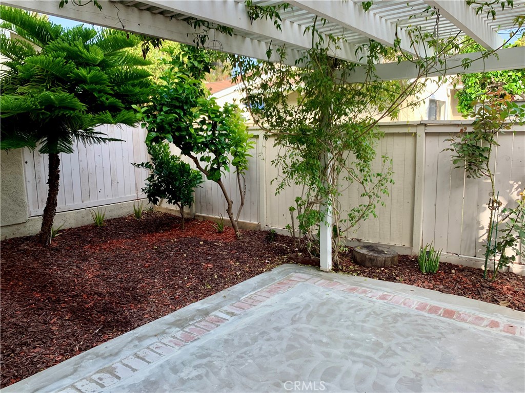 23 Sunfish, Unit 33 Irvine, CA 92604 - Photo 16 of 32 a view of a house with a street