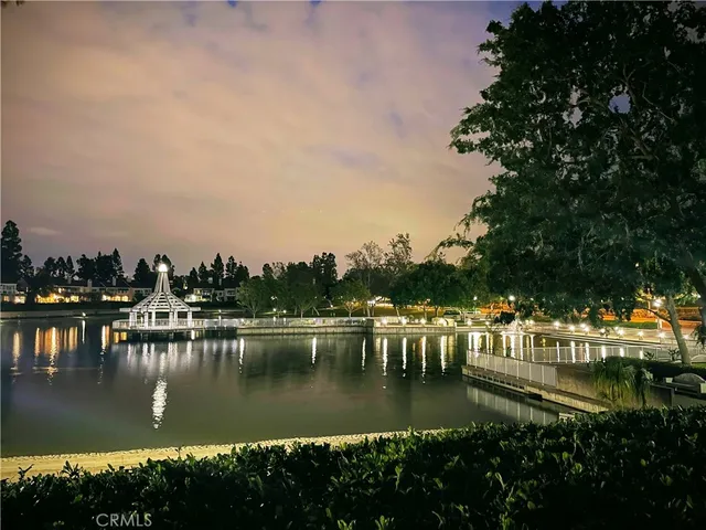 a view of a city with a lake