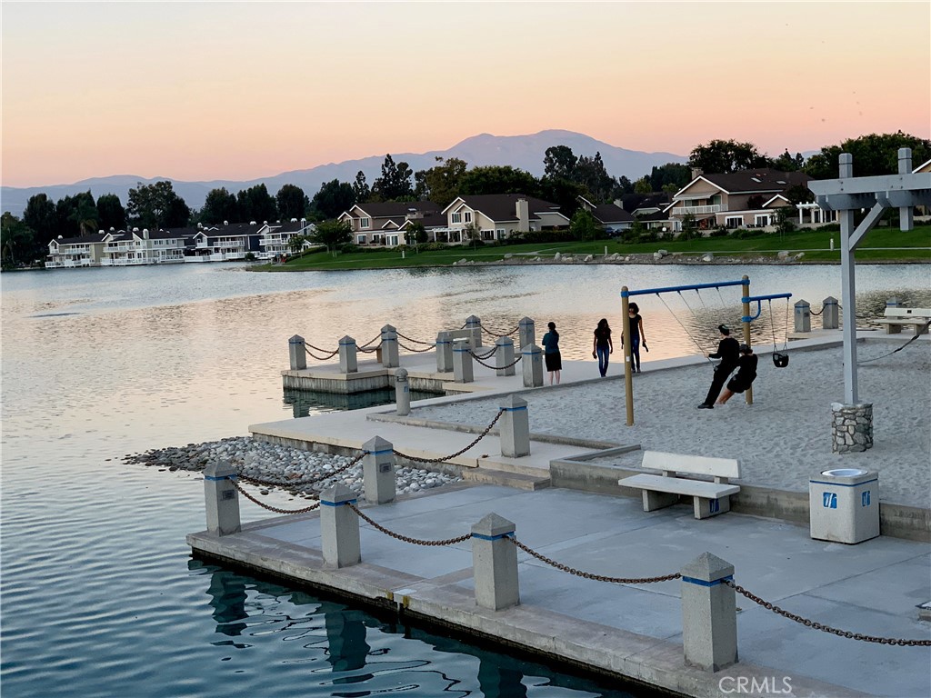 23 Sunfish, Unit 33 Irvine, CA 92604 - Photo 29 of 32 a view of a lake with outdoor seating