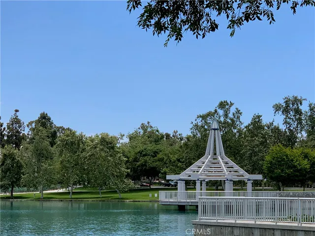 a view of swimming pool in front of house