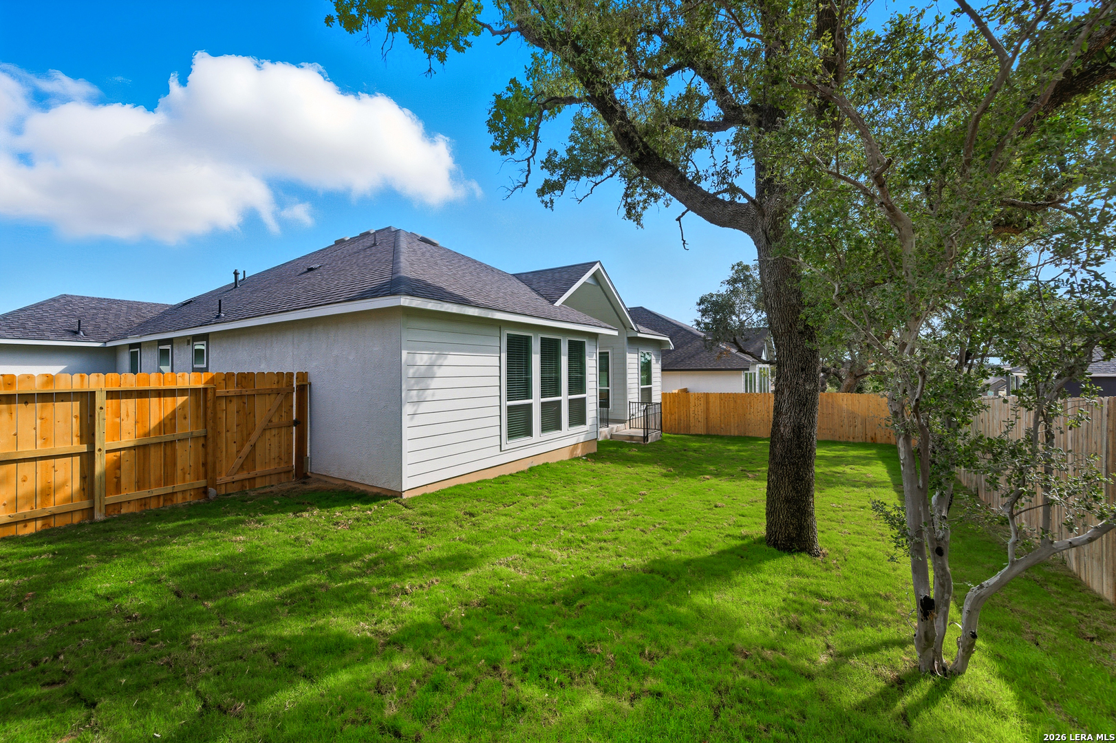 210 Kari Drive Castroville, TX 78009 - Photo 25 of 29 a view of a house with backyard
