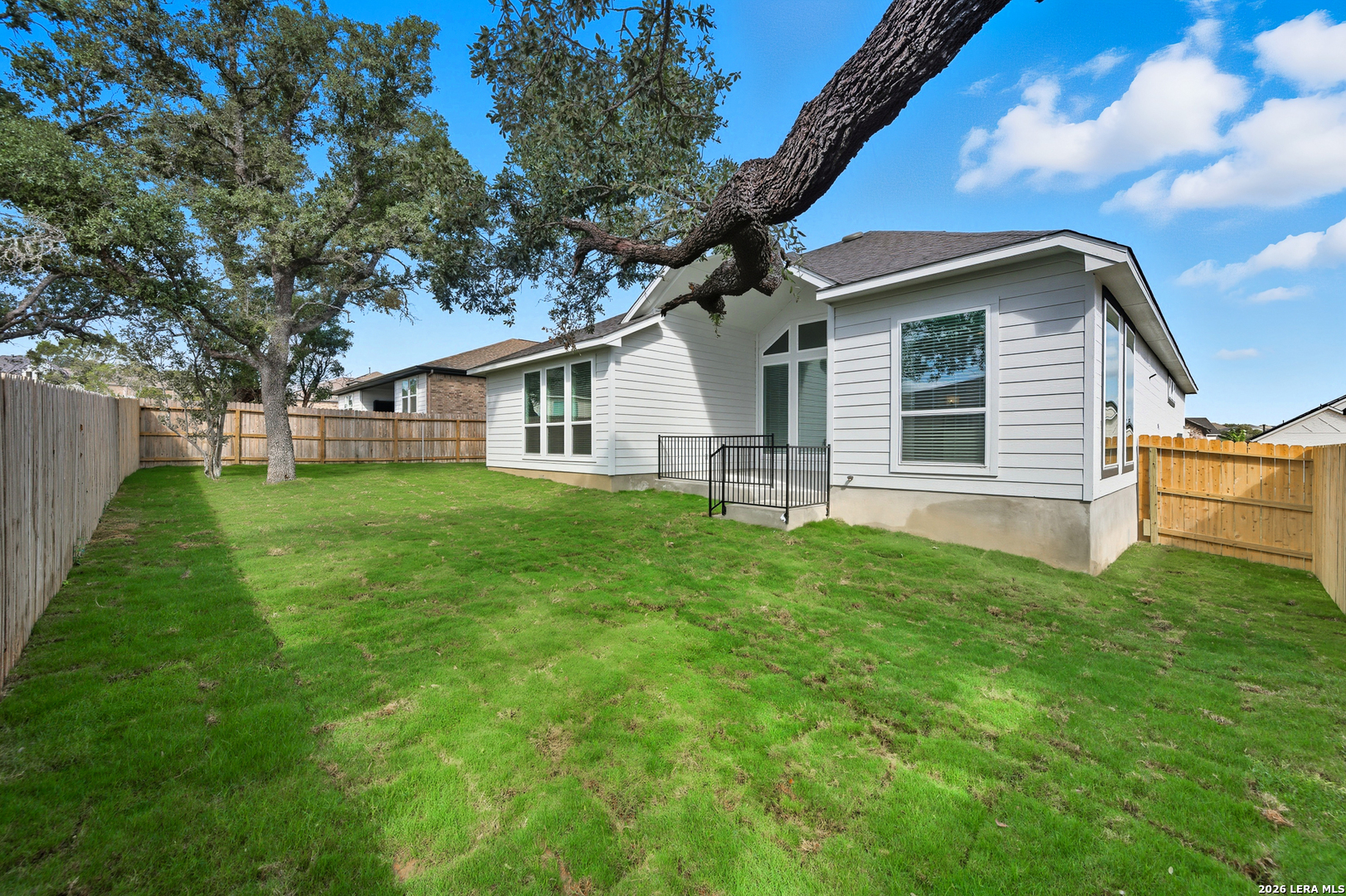 210 Kari Drive Castroville, TX 78009 - Photo 27 of 29 a view of a house with a yard