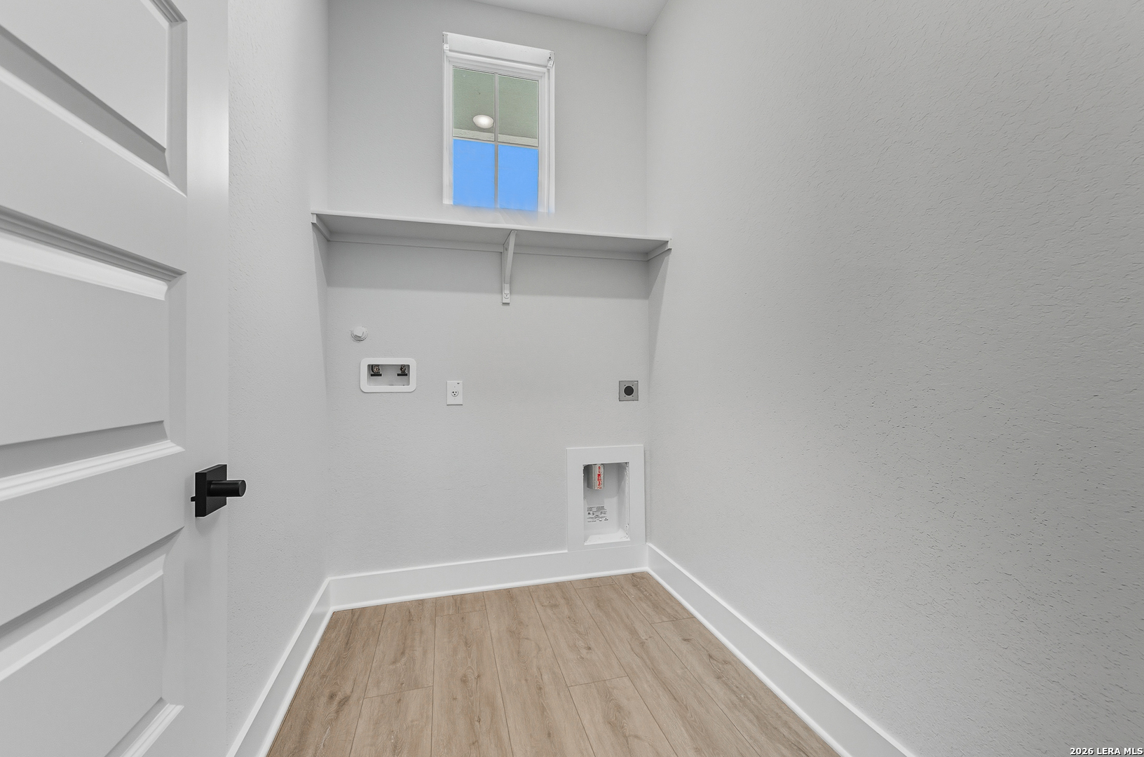210 Kari Drive Castroville, TX 78009 - Photo 5 of 29 a view of empty room with wooden floor and fan