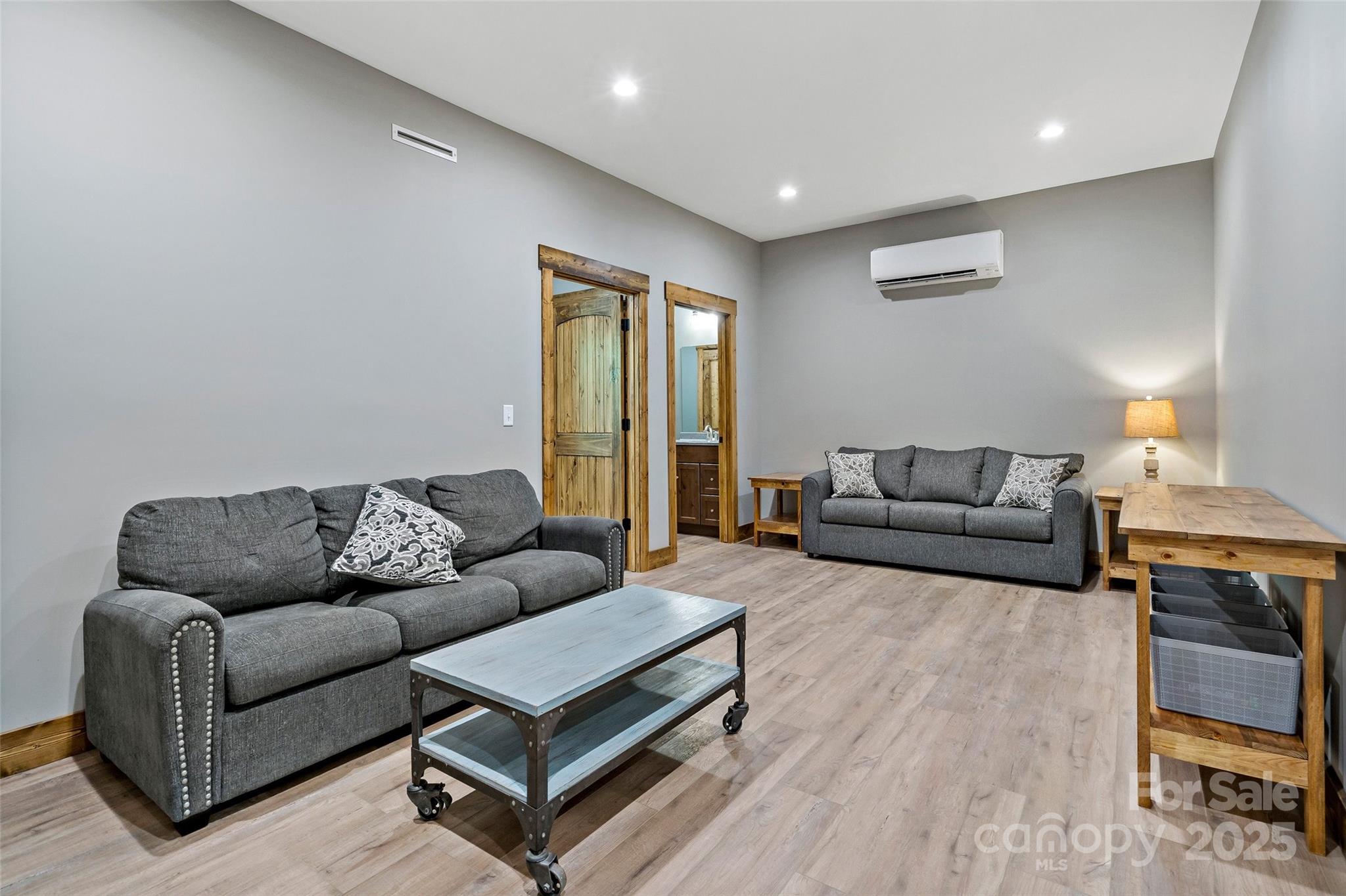 23 Laurel Crest Lane Mill Spring, NC 28756 - Photo 26 of 46 a living room with furniture and a couch