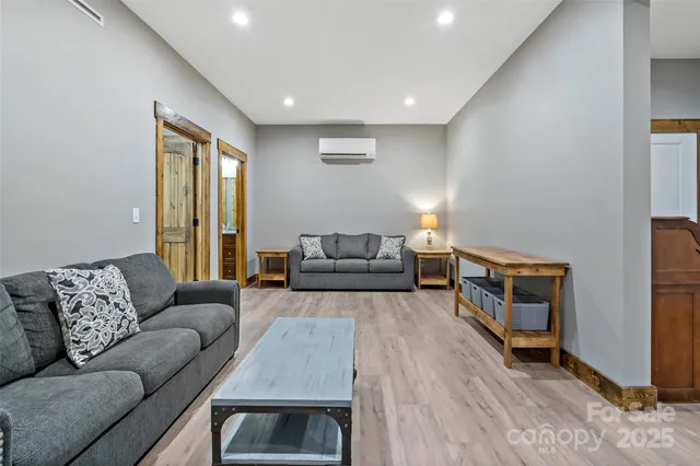 a living room with furniture and a couch