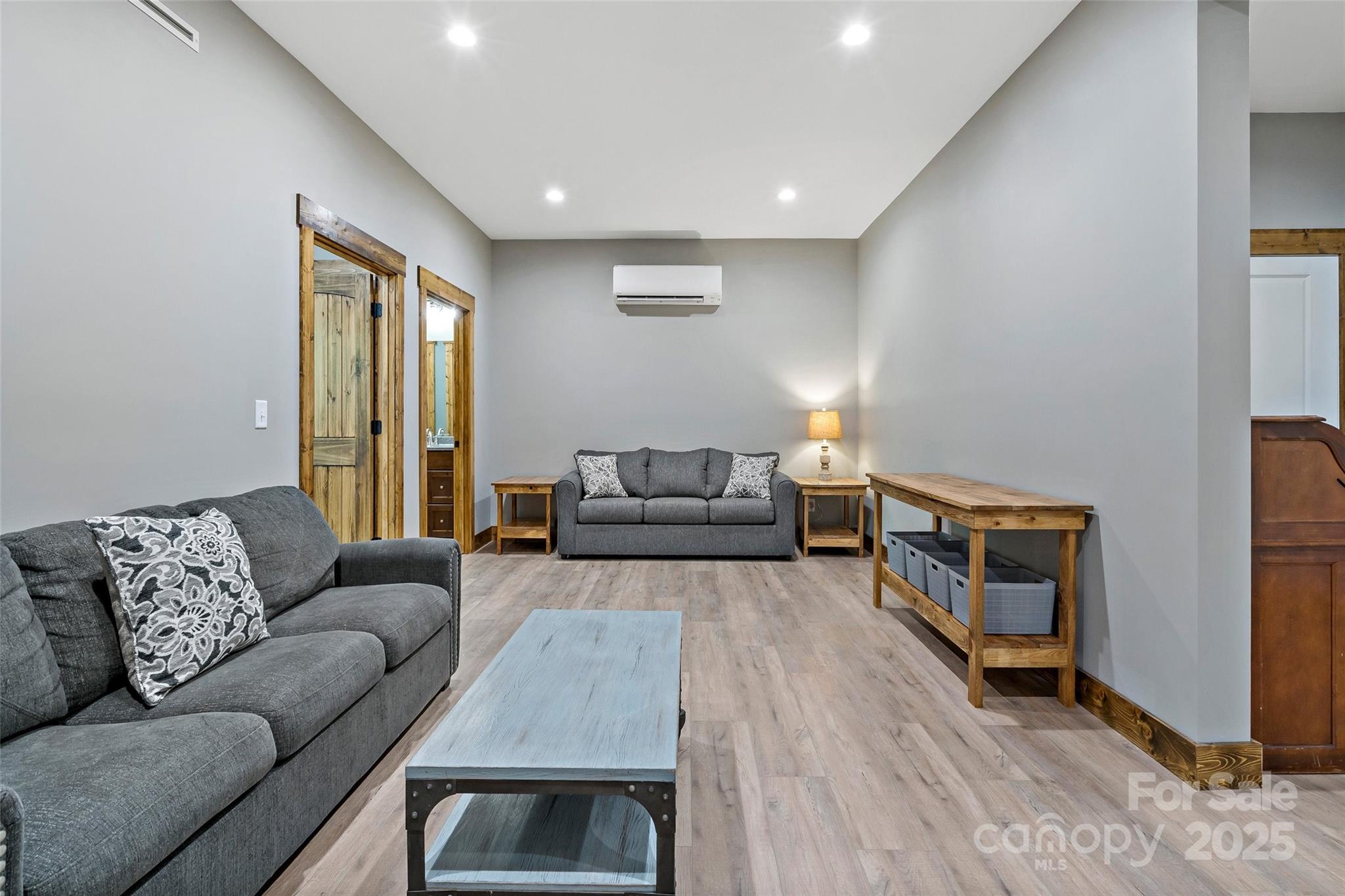 23 Laurel Crest Lane Mill Spring, NC 28756 - Photo 27 of 46 a living room with furniture and a couch
