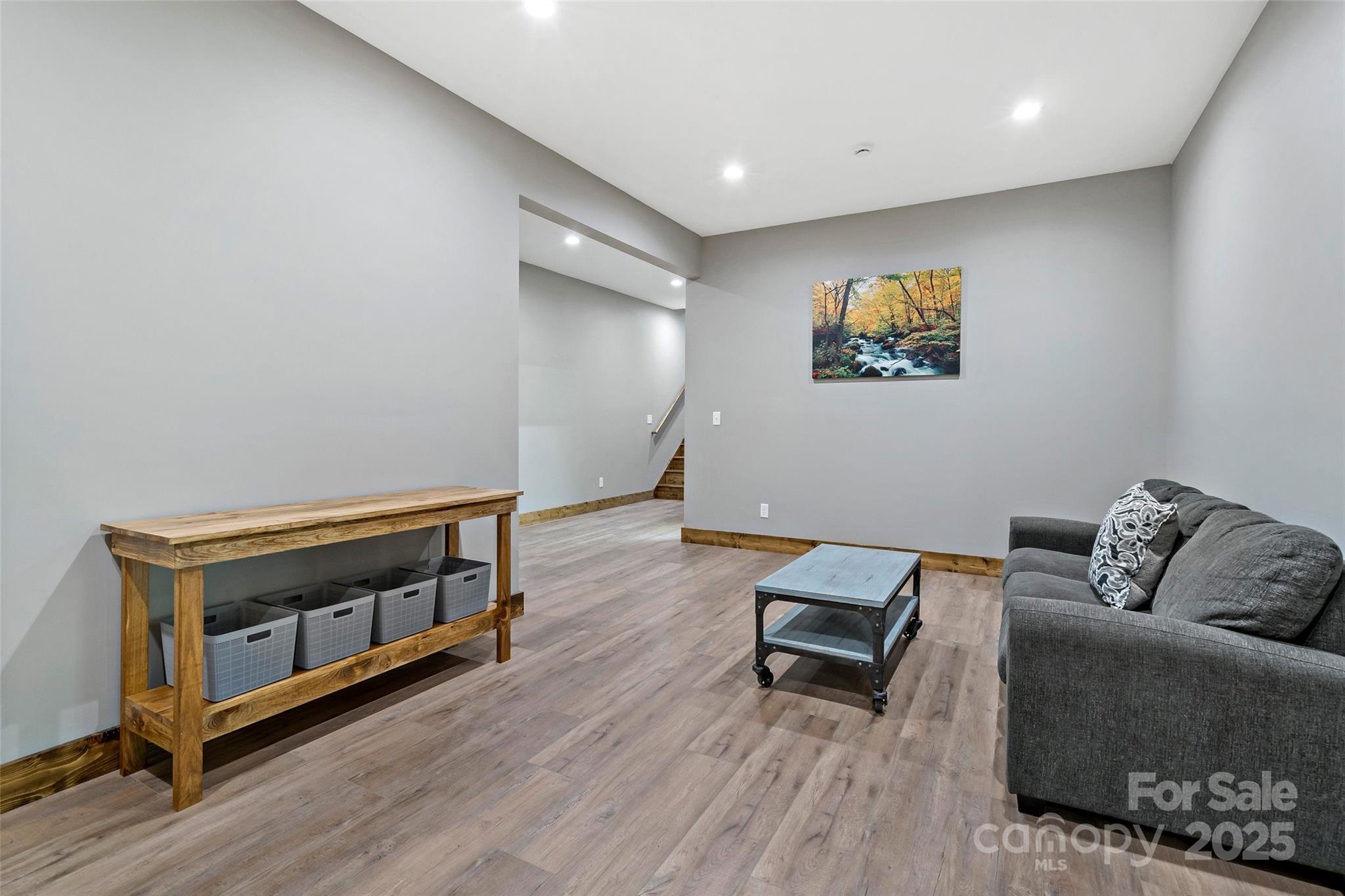 23 Laurel Crest Lane Mill Spring, NC 28756 - Photo 28 of 46 a living room with furniture and a couch