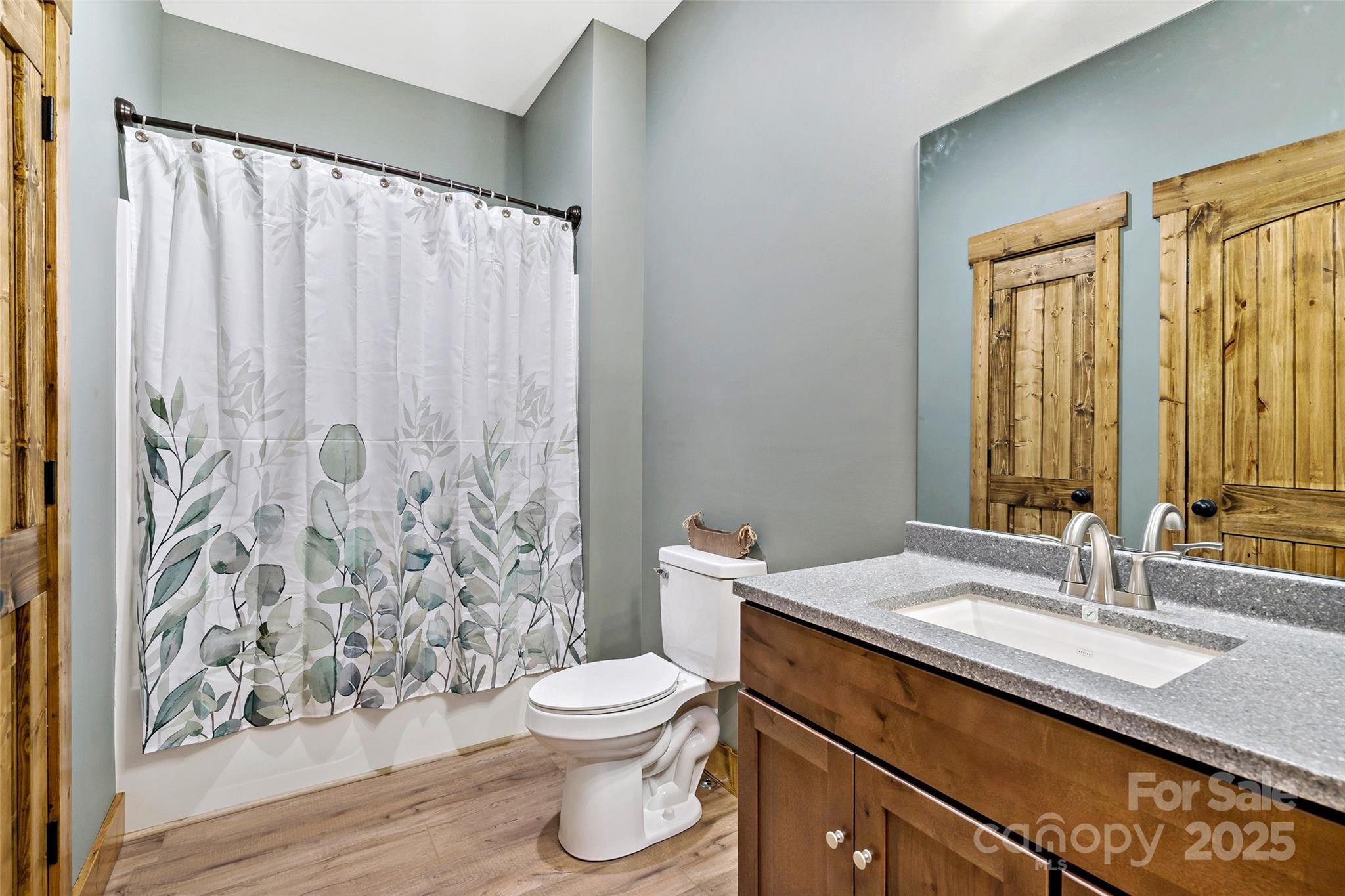 23 Laurel Crest Lane Mill Spring, NC 28756 - Photo 32 of 46 a bathroom with a sink and a mirror