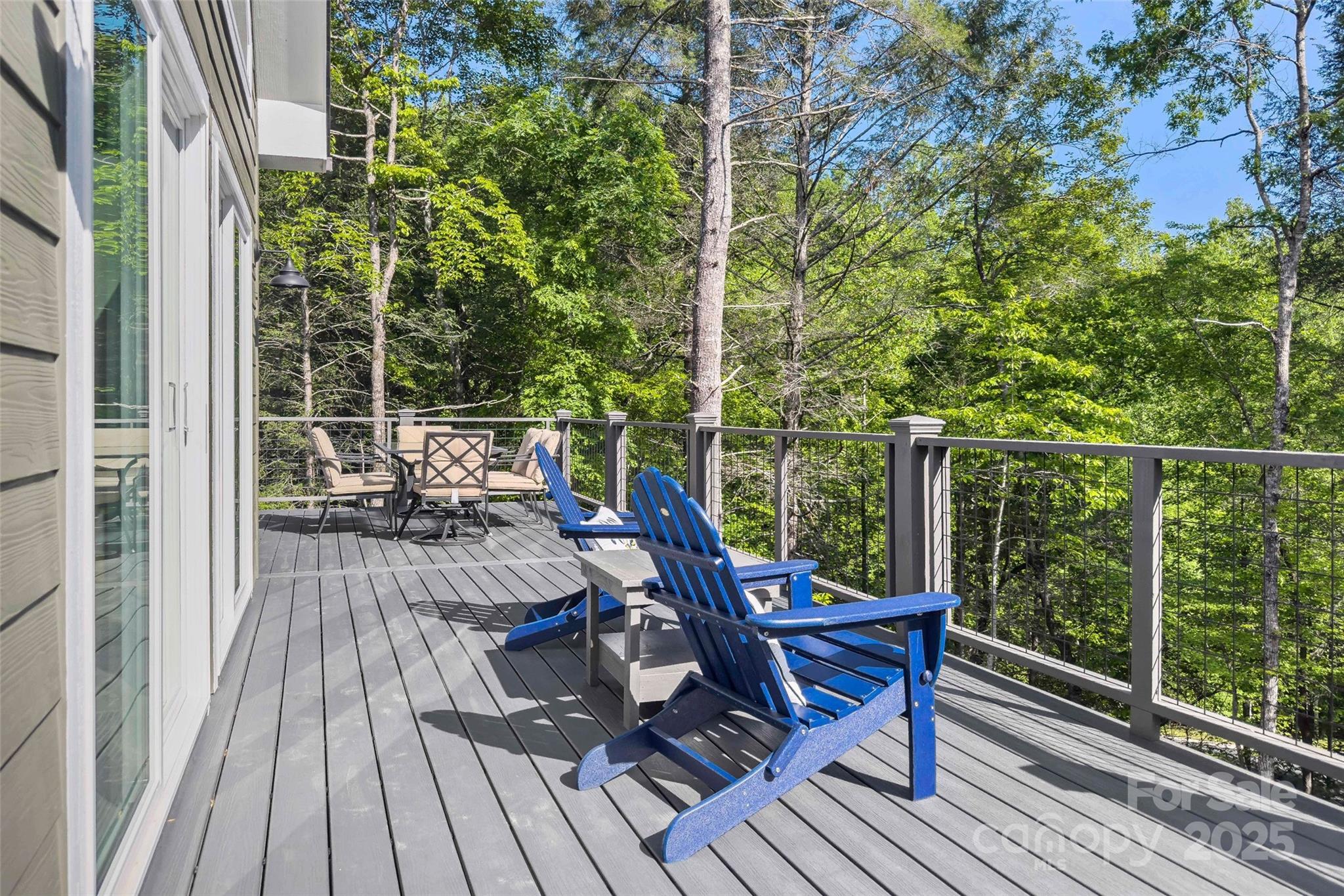 23 Laurel Crest Lane Mill Spring, NC 28756 - Photo 39 of 46 a view of balcony with wooden floor and outdoor seating