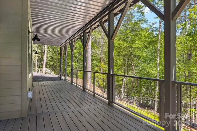 a bench sitting in a lake next to a building