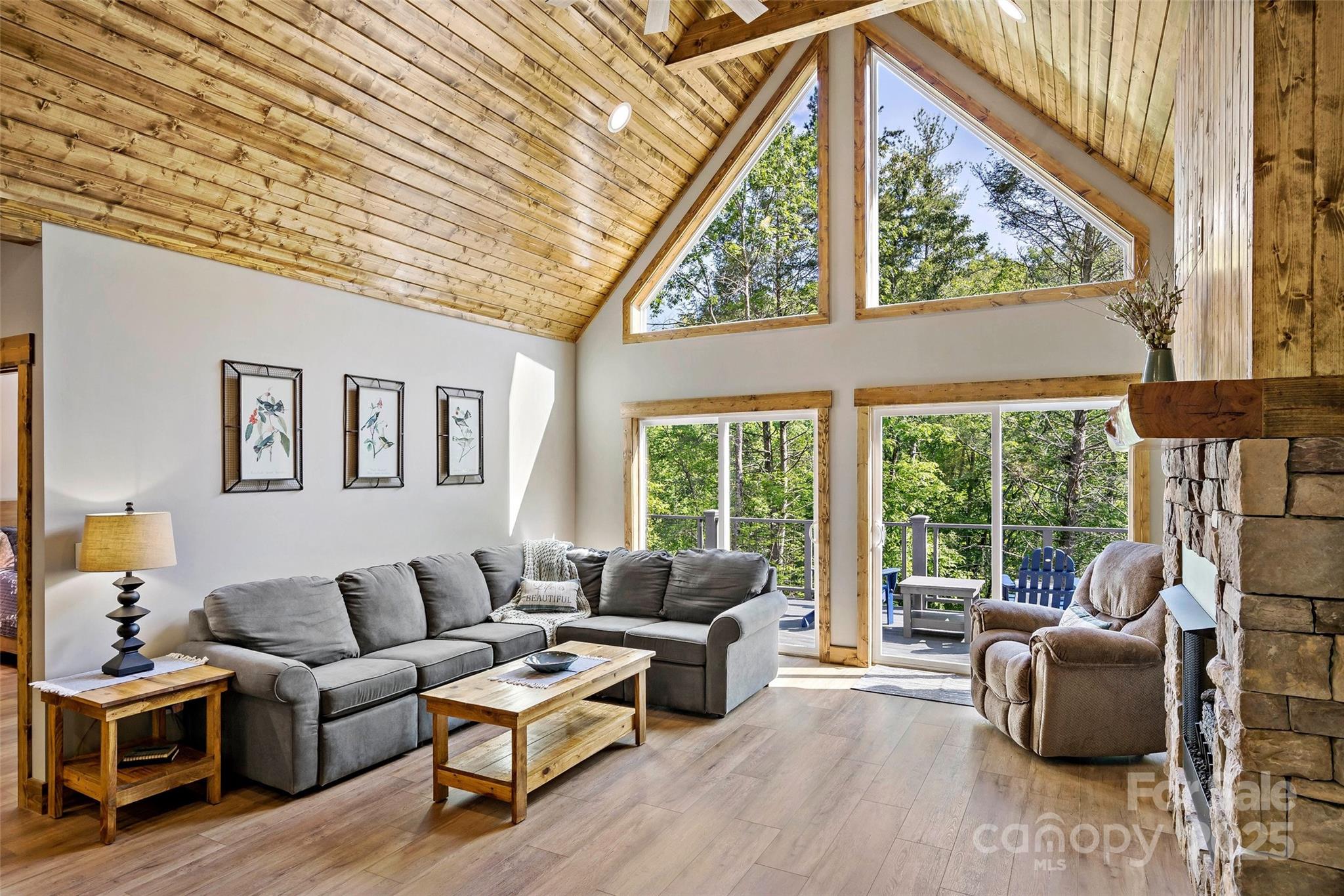 23 Laurel Crest Lane Mill Spring, NC 28756 - Photo 5 of 46 a living room with furniture and a large window