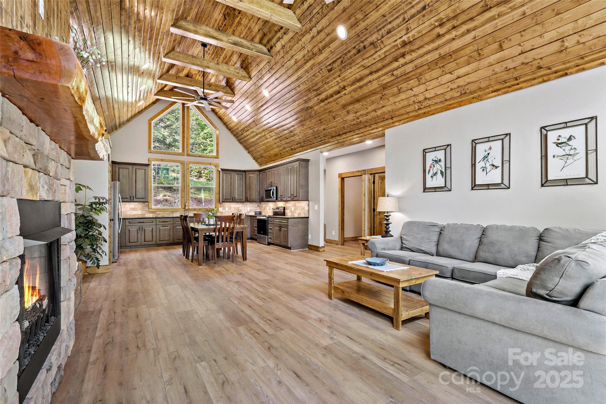 23 Laurel Crest Lane Mill Spring, NC 28756 - Photo 7 of 46 a living room with furniture and a wooden floor
