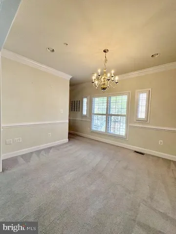 a kitchen with stainless steel appliances a sink stove and cabinets