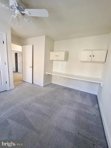 a bathroom with a shower and a bath tub