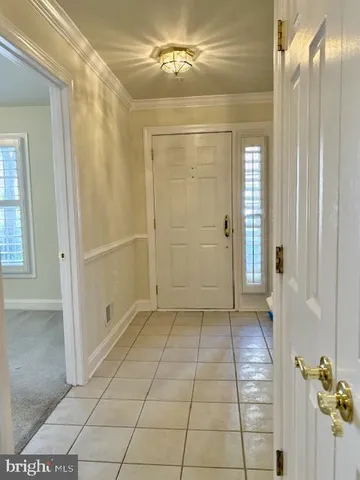 a bathroom with a glass door shower