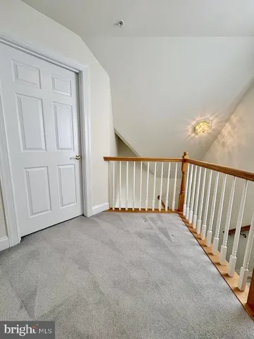 a kitchen with a sink appliances and cabinets