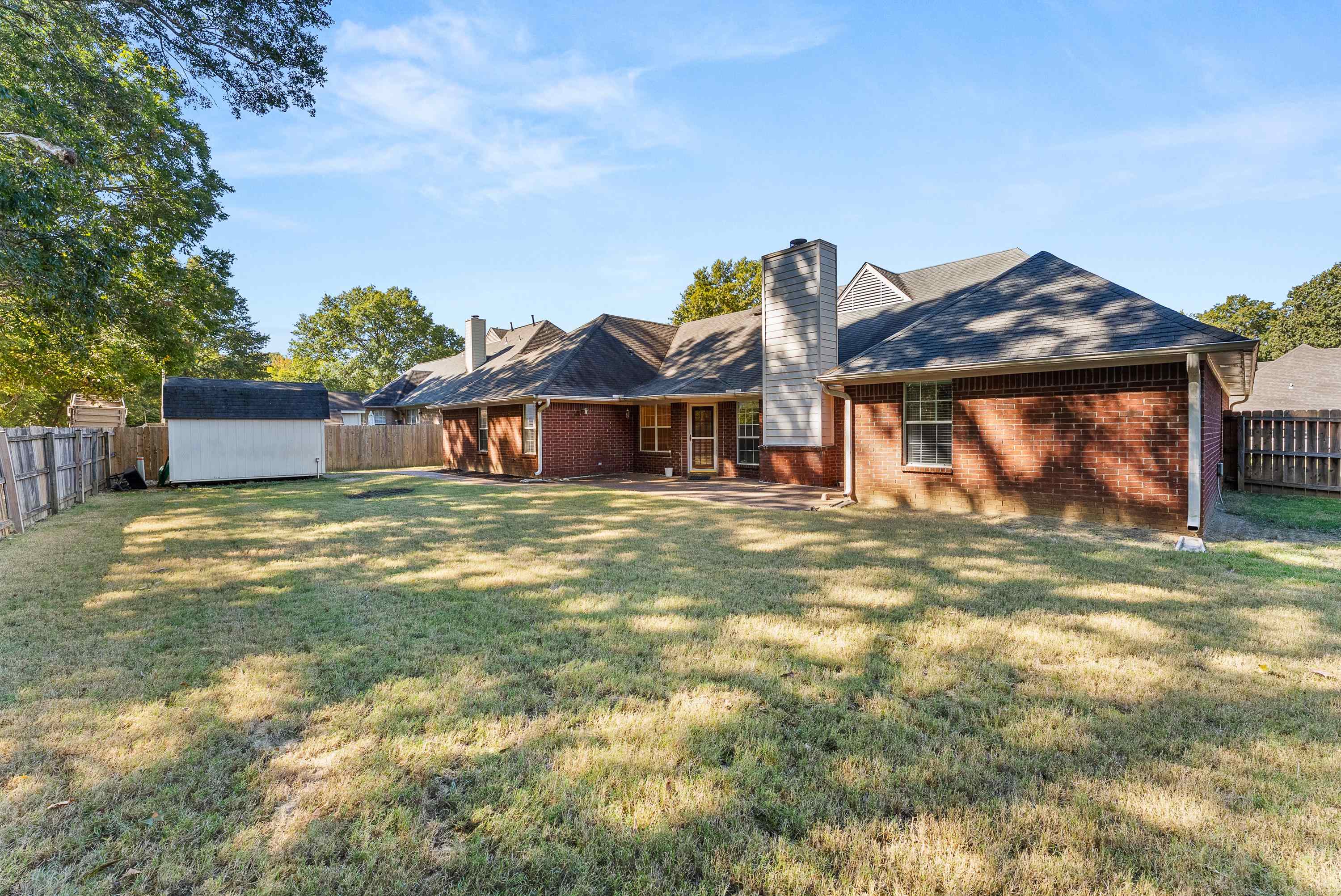 978 Sugar Lane Collierville, TN 38017 - Photo 13 of 14 a front view of a house with garden