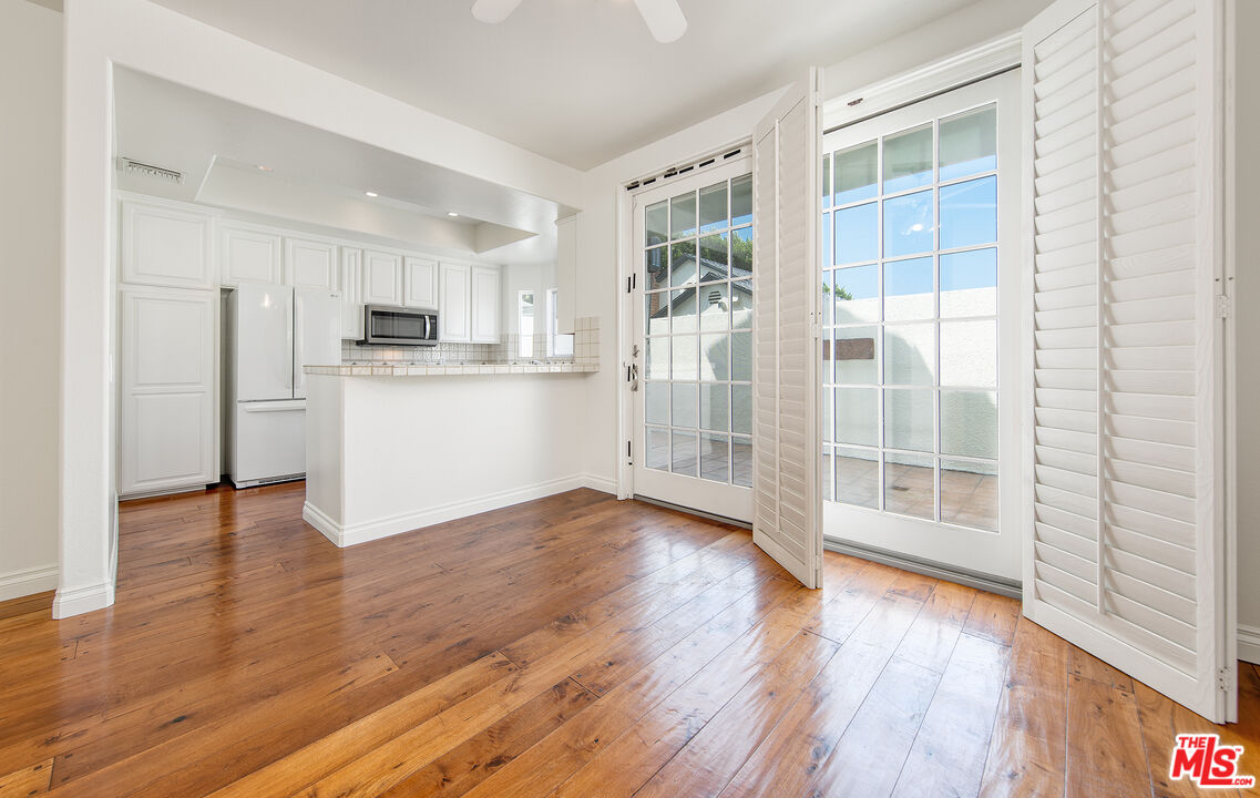 2333 Oak Street, Unit 2 Santa Monica, CA 90405 - Photo 17 of 30 a view of a kitchen with wooden floor and electronic appliances
