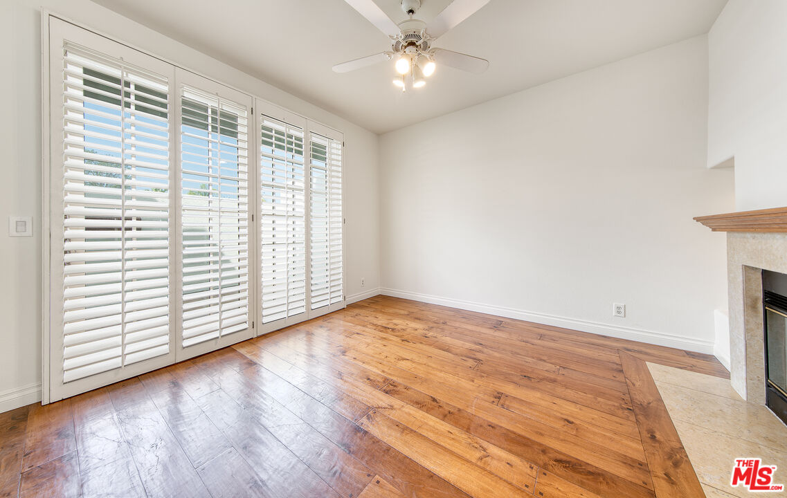 2333 Oak Street, Unit 2 Santa Monica, CA 90405 - Photo 19 of 30 an empty room with wooden floor and windows