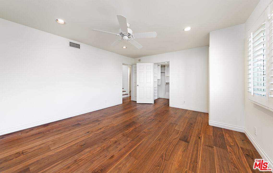 2333 Oak Street, Unit 2 Santa Monica, CA 90405 - Photo 24 of 30 a view of an empty room with wooden floor and a window