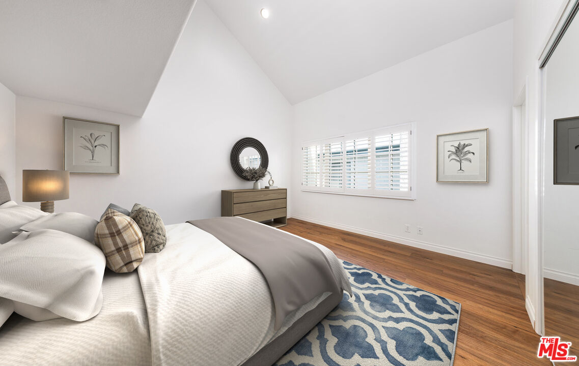 2333 Oak Street, Unit 2 Santa Monica, CA 90405 - Photo 5 of 30 a bedroom with a bed and wooden floor