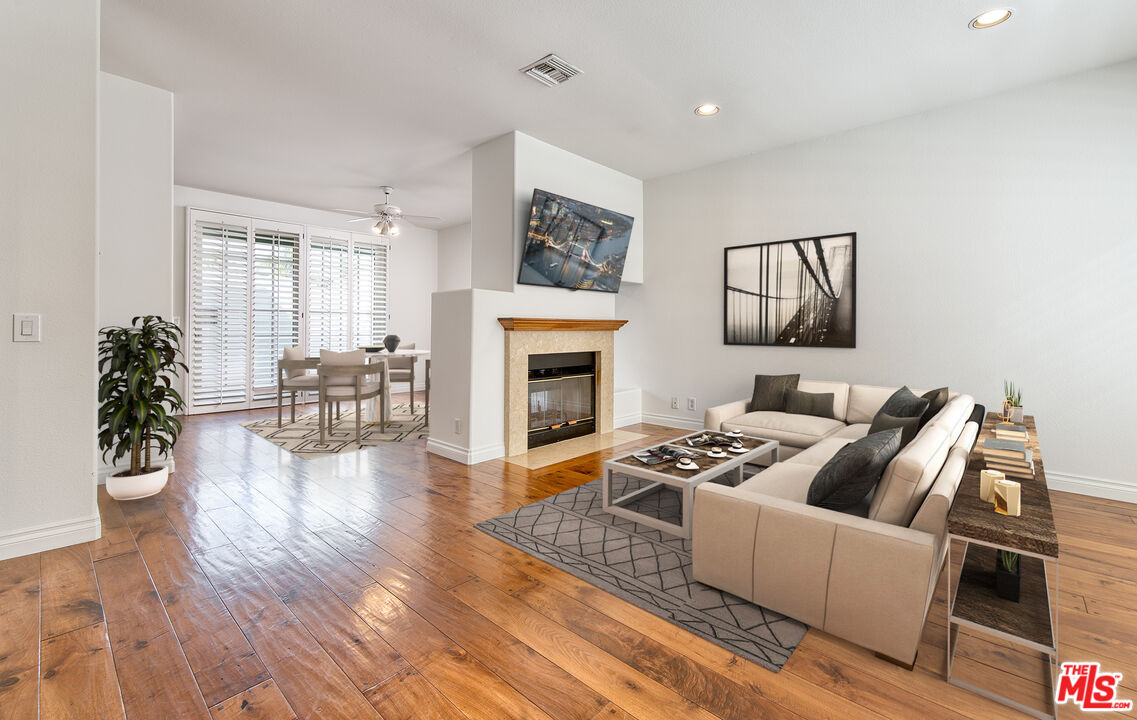 2333 Oak Street, Unit 2 Santa Monica, CA 90405 - Photo 7 of 30 a living room with furniture and a fireplace