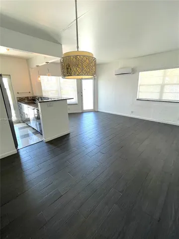 a view of balcony with furniture