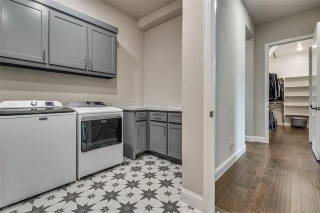 a view of a kitchen with electric appliances
