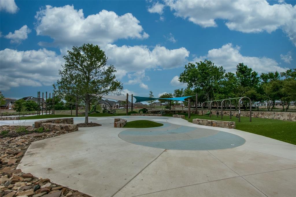 11112 Lacey Oak Ridge Flower Mound, TX 76226 - Photo 40 of 40 a view of a swimming pool and lounge chairs
